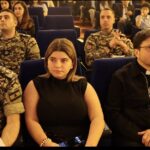 Responsables du Collège des Sœurs du Rosaire et représentants de l’État dans le théâtre lors de la Fête de l’Indépendance 2025